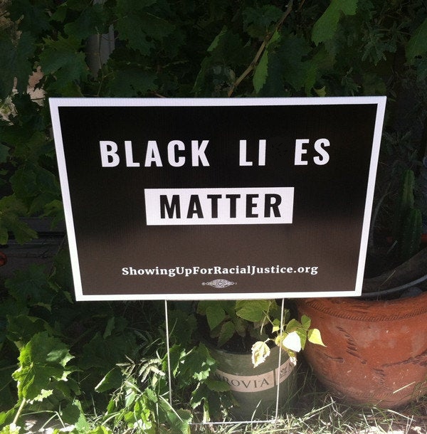 black LIES matter sign in yard